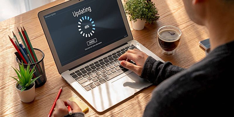 pngtree-upgrading-device-software-to-the-latest-version-using-computer-software-update-photo-image_49351838